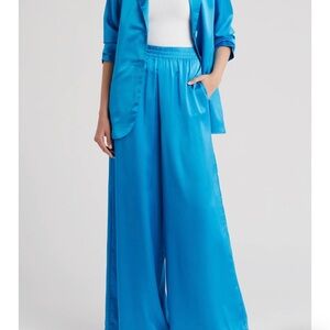 Show me your mumu Irwin pant in satin blue. Size medium